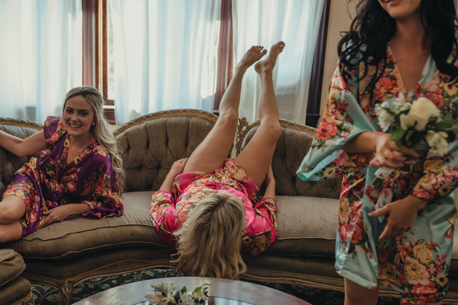 Wedgewood Sequoia Mansion wedding bridesmaids legs in the air photo