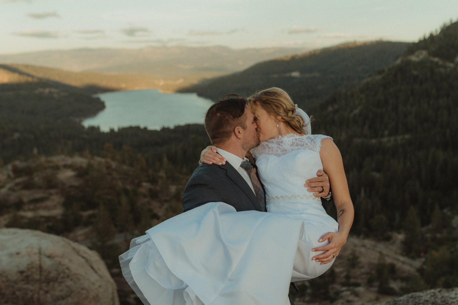 North Lake Tahoe wedding groom picking up bride photo