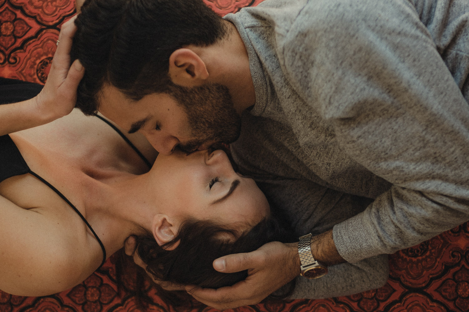 North Lake Tahoe engagement couple laying on the floor photo