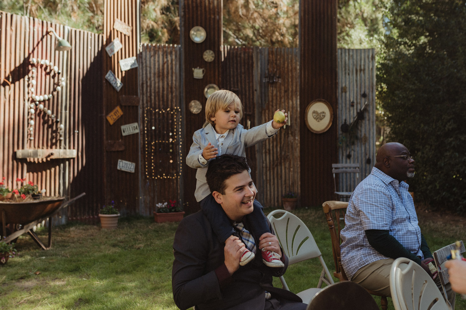 Nevada City wedding boy on dad's shoulders photo