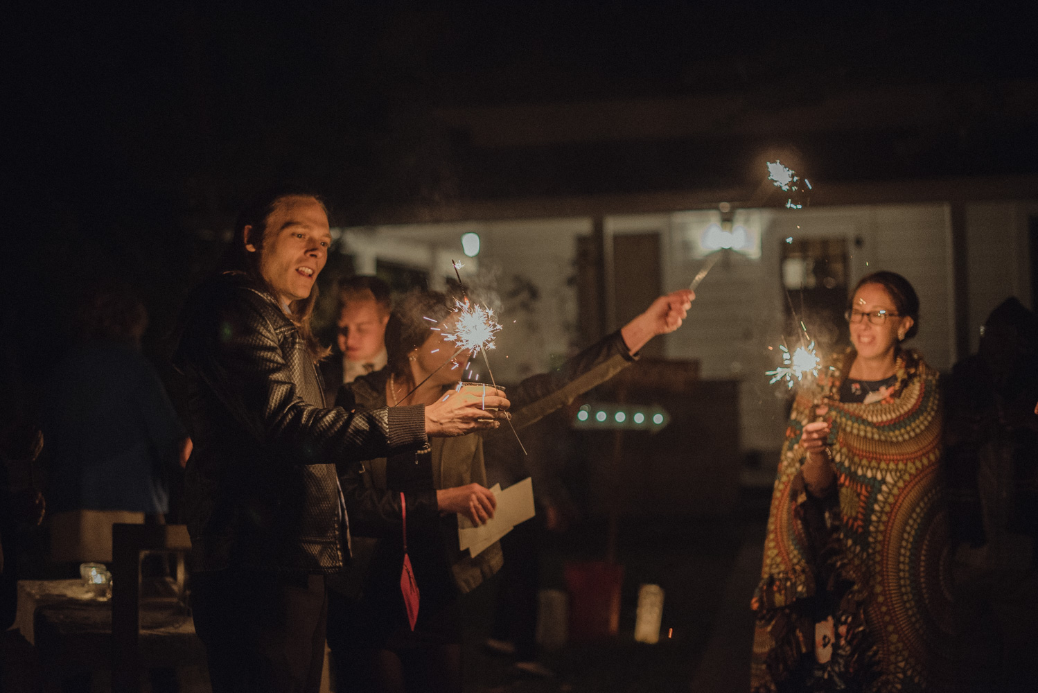 Nevada City wedding guests turning on their sparklers photo 