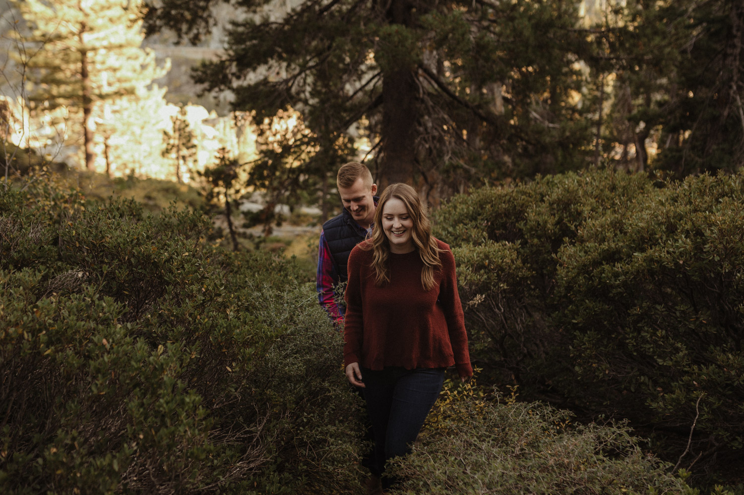 Donner Engagement session couple walking on a trail photo.