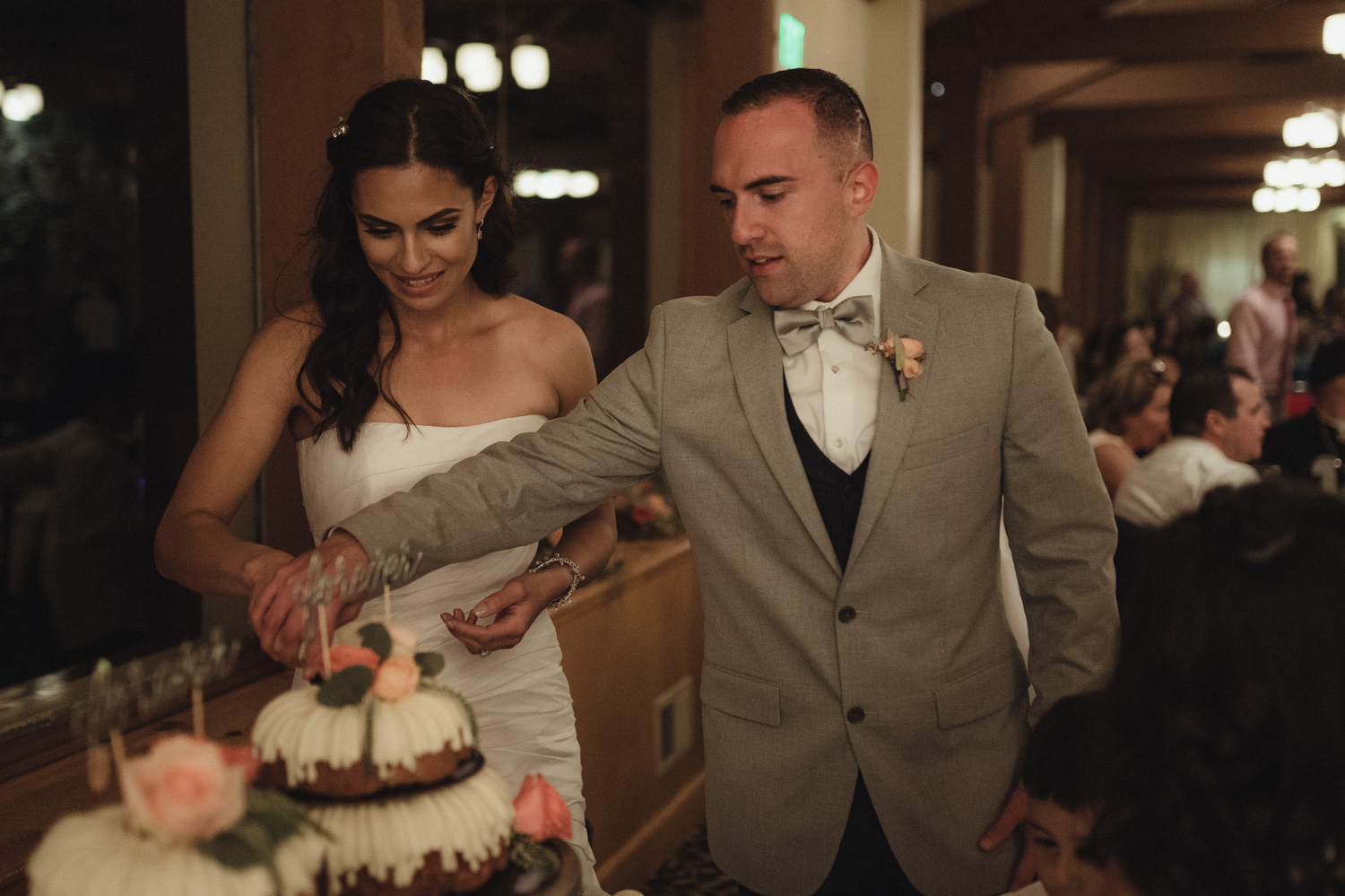 Tannenbaum Wedding Venue couple cutting the cake photo