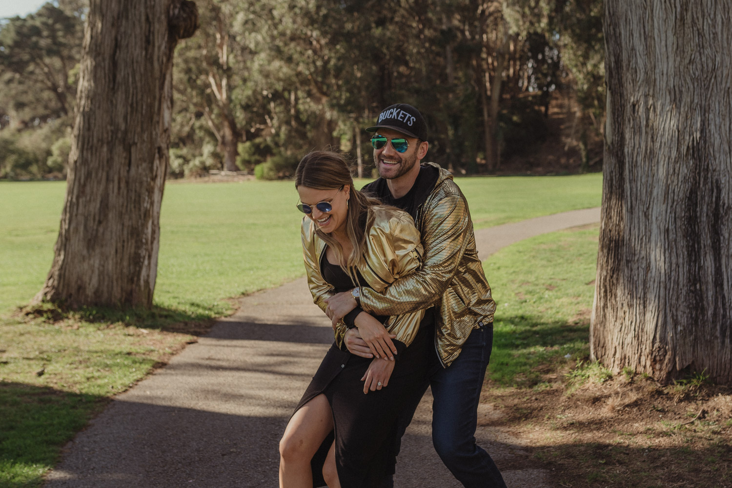 San Francisco engagement photos at Golden Gate Park couple laughing photo