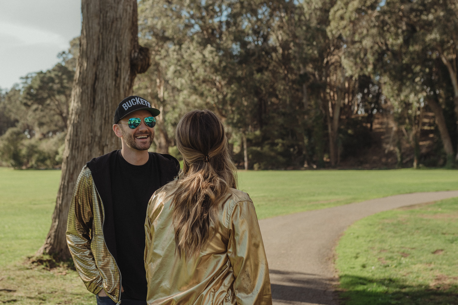 San Francisco engagement photos at Golden Gate Park couple looking at each other photo