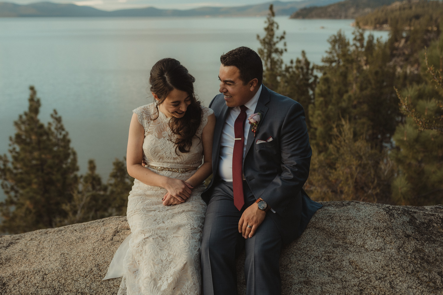 Logan Shoals elopement couple laughing on a granite rock photo