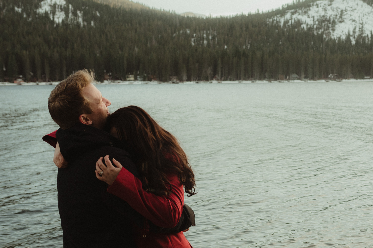Donner Lake couples session couple hugging by the lake photo