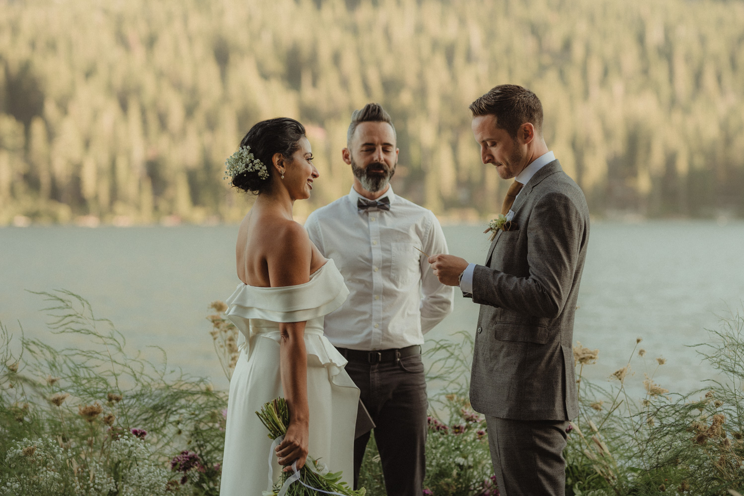 Lake Tahoe pop-up wedding/elopement groom reading his vows photo