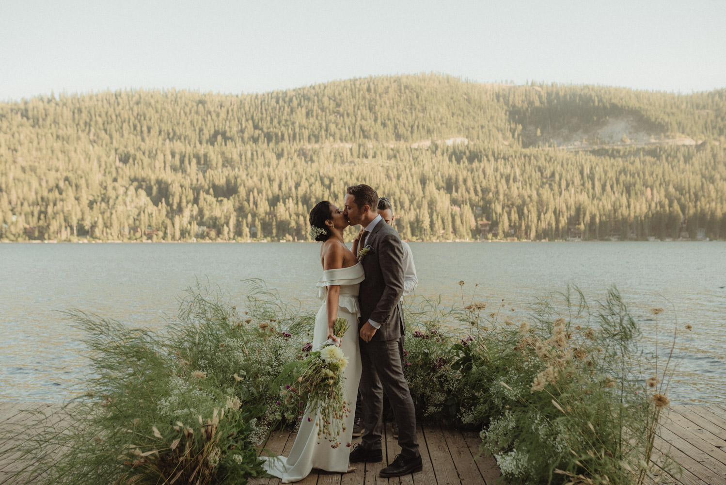 Lake Tahoe pop-up wedding/elopement couple kissing during the ceremony photo