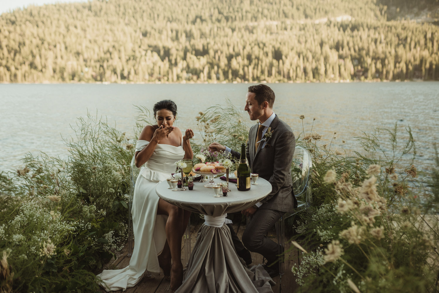 Lake Tahoe pop-up wedding/elopement couple feeding each other photo