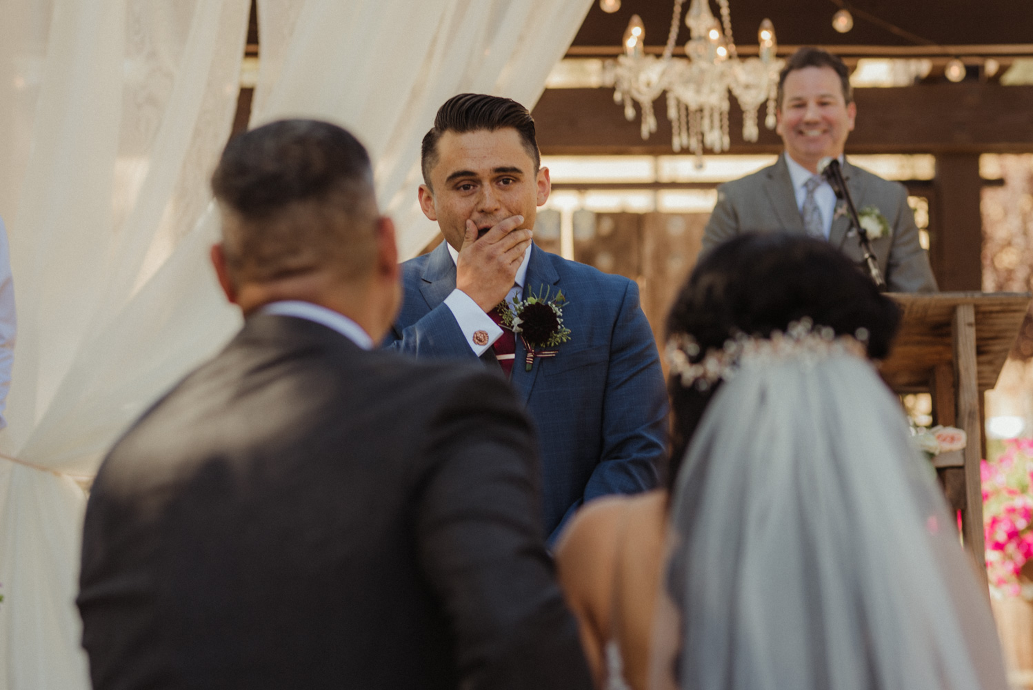 Ranch victoria vineyards wedding groom's reaction to his bride walking down the isle photo