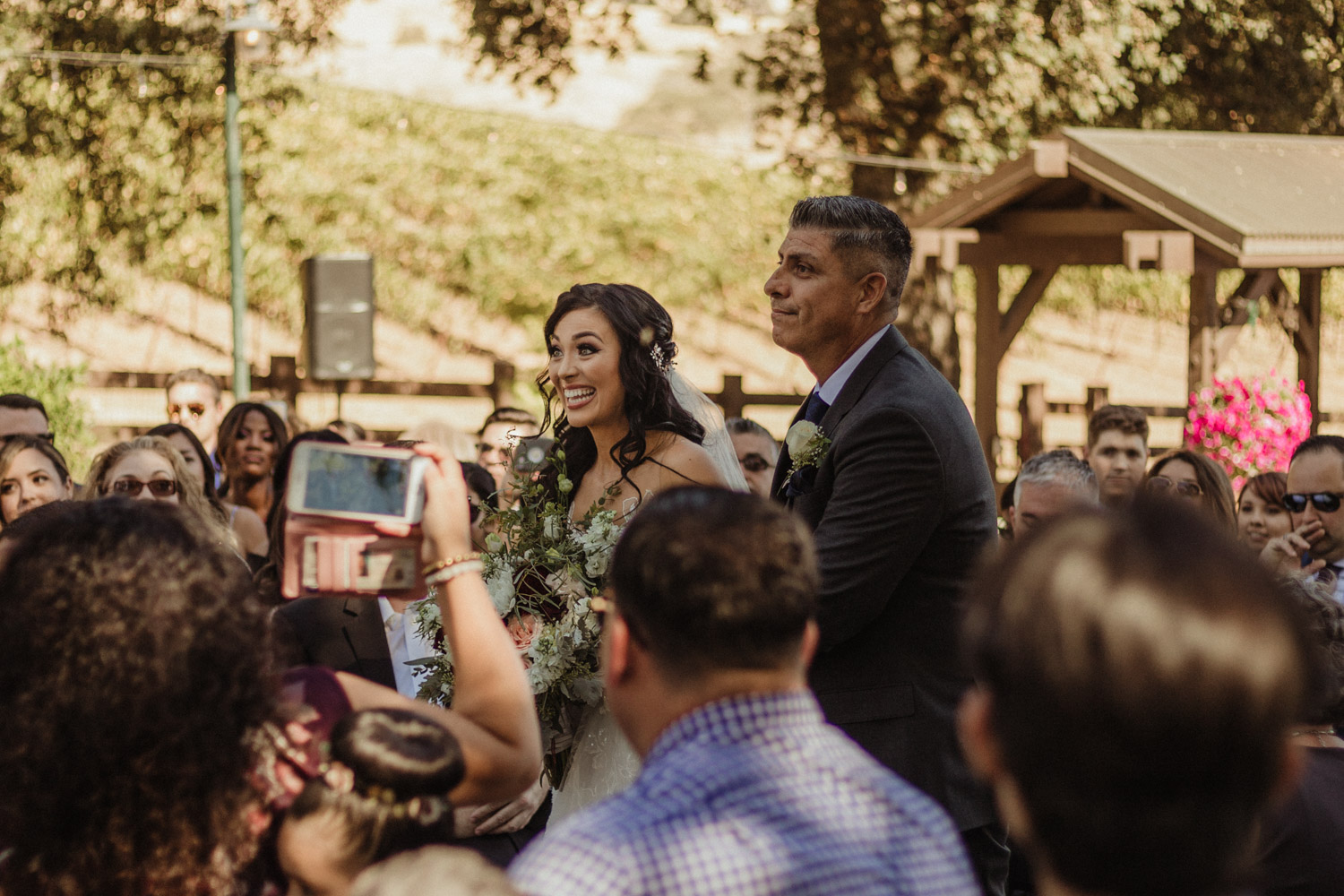 Ranch victoria vineyards wedding bride walking down the isle photo