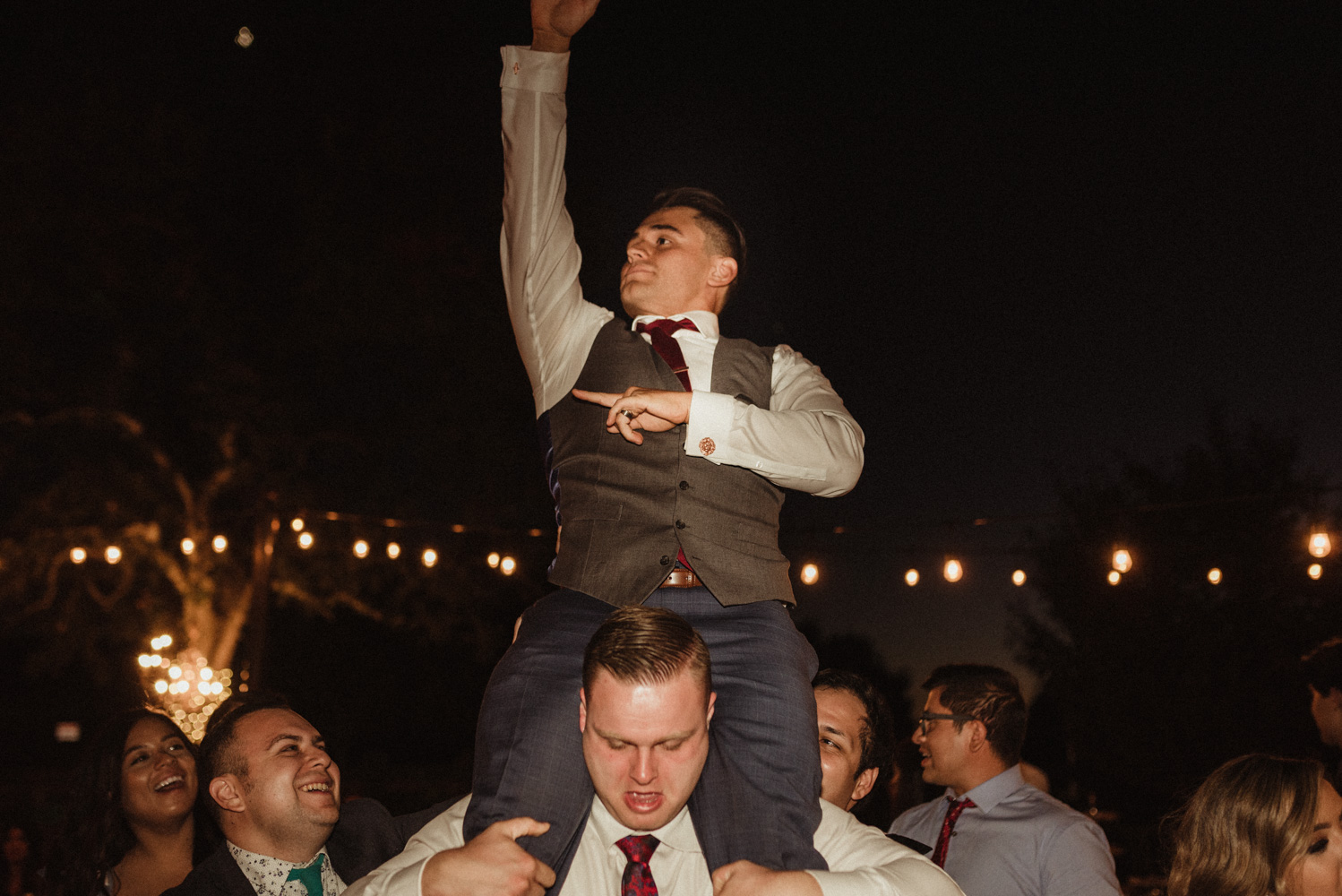 Ranch Victoria vineyard wedding groom getting picked up on the dance floor photo