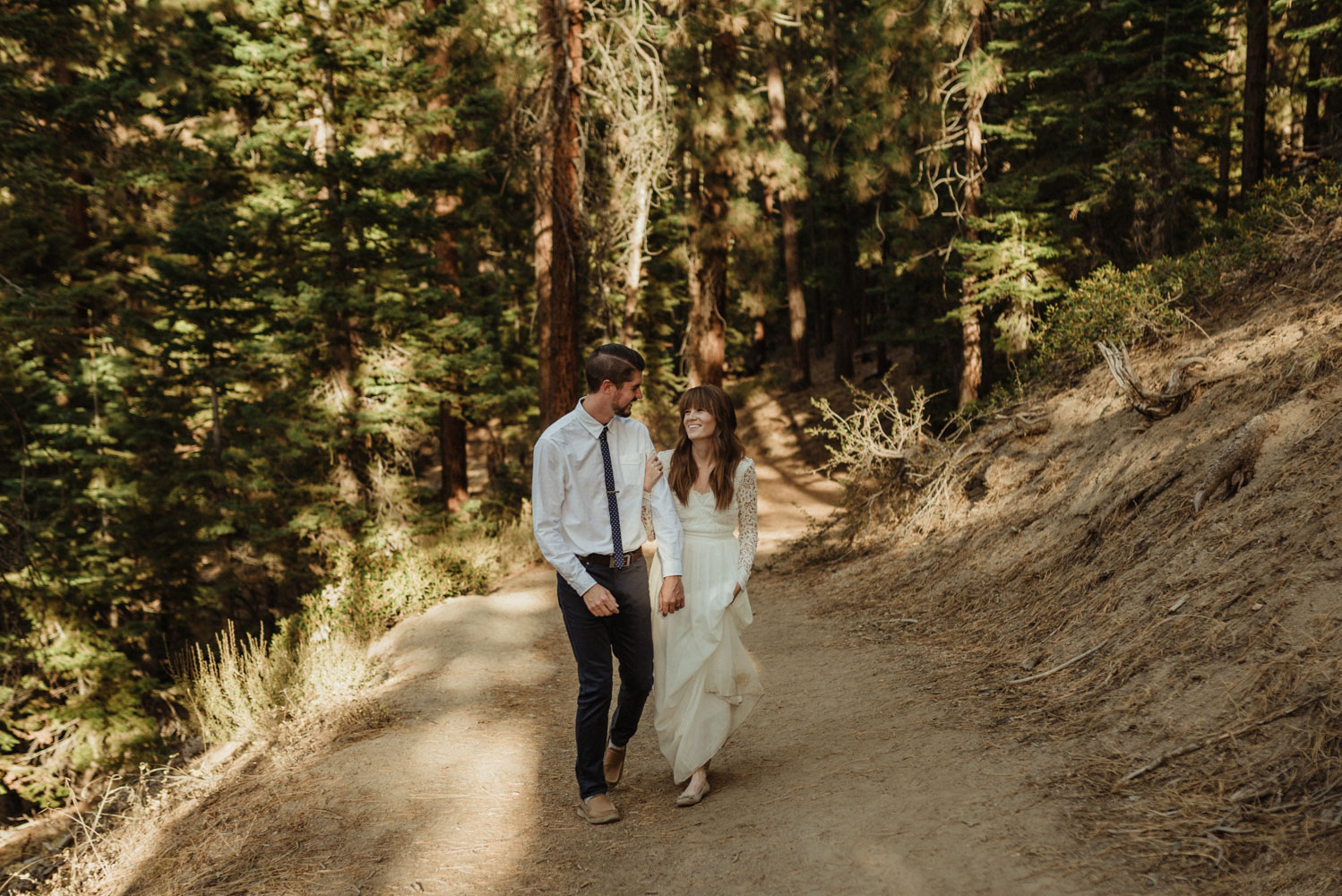 Lake Tahoe vow renewal couple walking on a trail photo