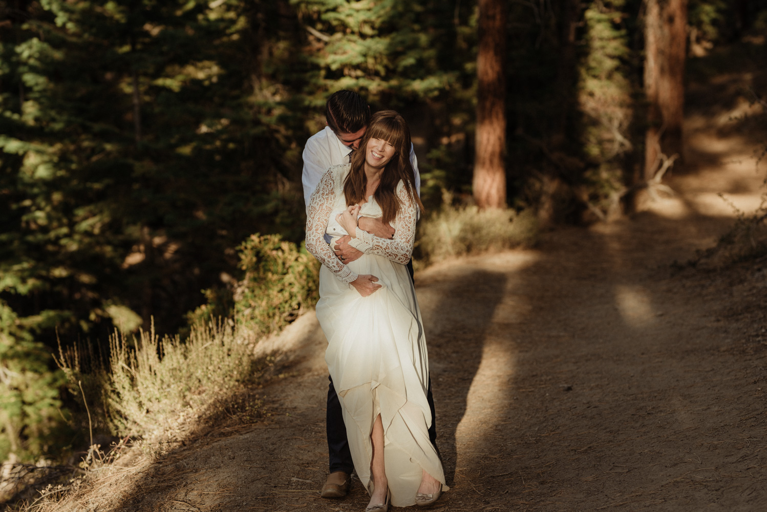 Lake Tahoe vow renewal couple hugging photo