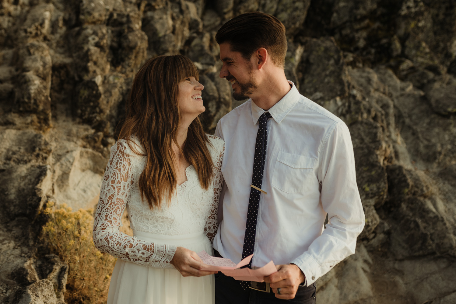 Lake Tahoe vow renewal couple sharing letters photo