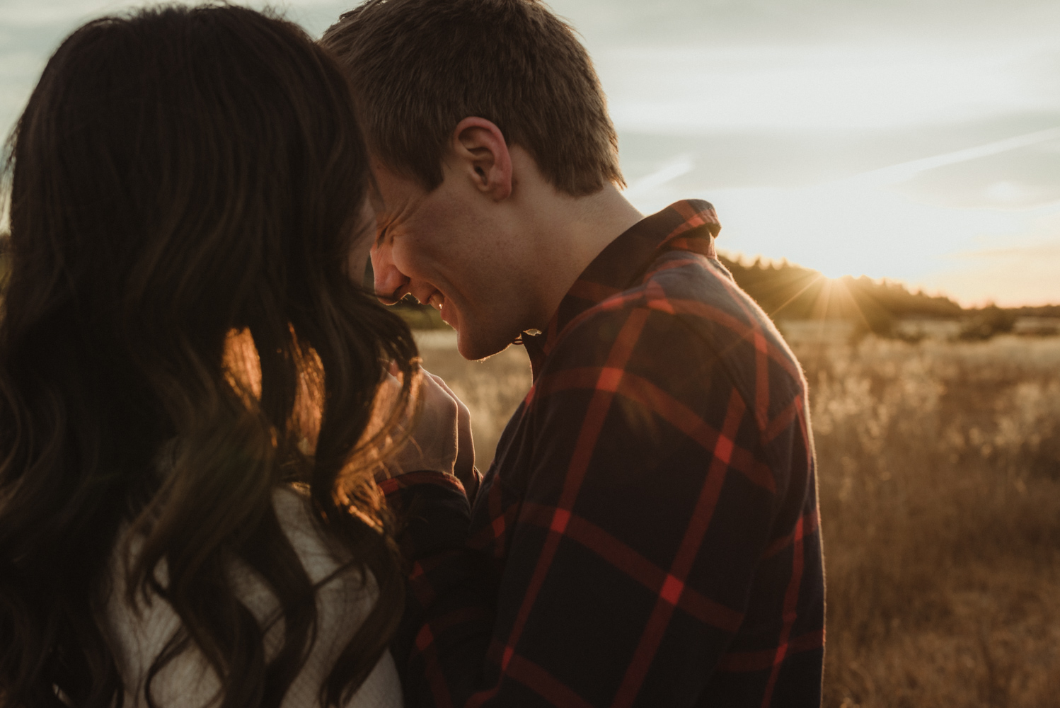 Tahoe meadows interpretive loop romantic sunrise session couple warming each others hands photo