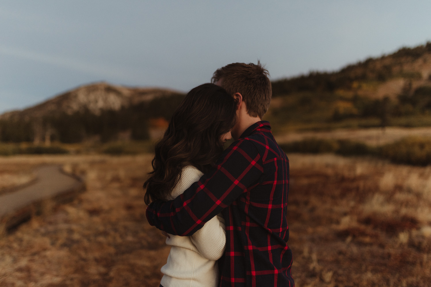 Tahoe meadows interpretive loop romantic sunrise session couple hugging photo
