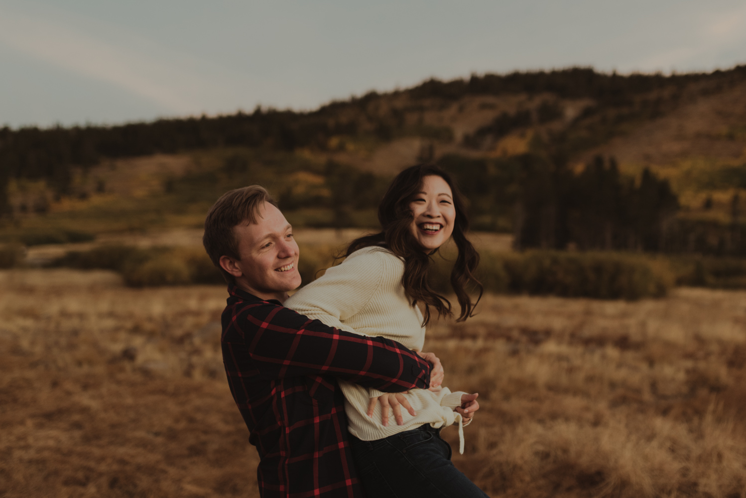 Tahoe meadows interpretive loop romantic sunrise session couple playing around photo