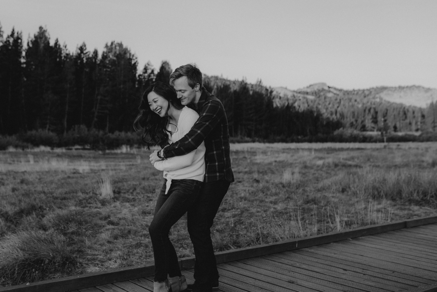 Tahoe meadows interpretive loop romantic sunrise session couple embracing each other photo