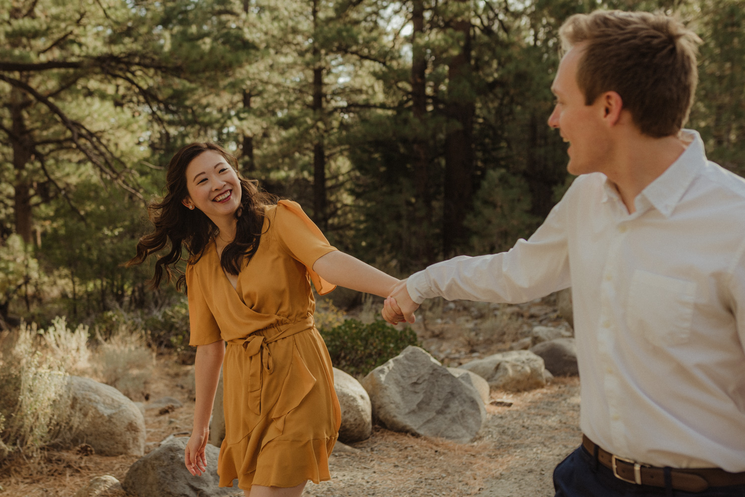 Galena Creek fall engagement session couple swinging around photo