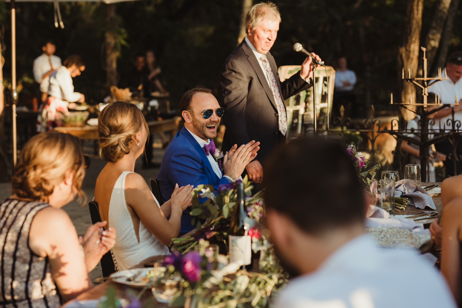 Triple S Ranch Wedding Venue, groom laughing during toasts photo