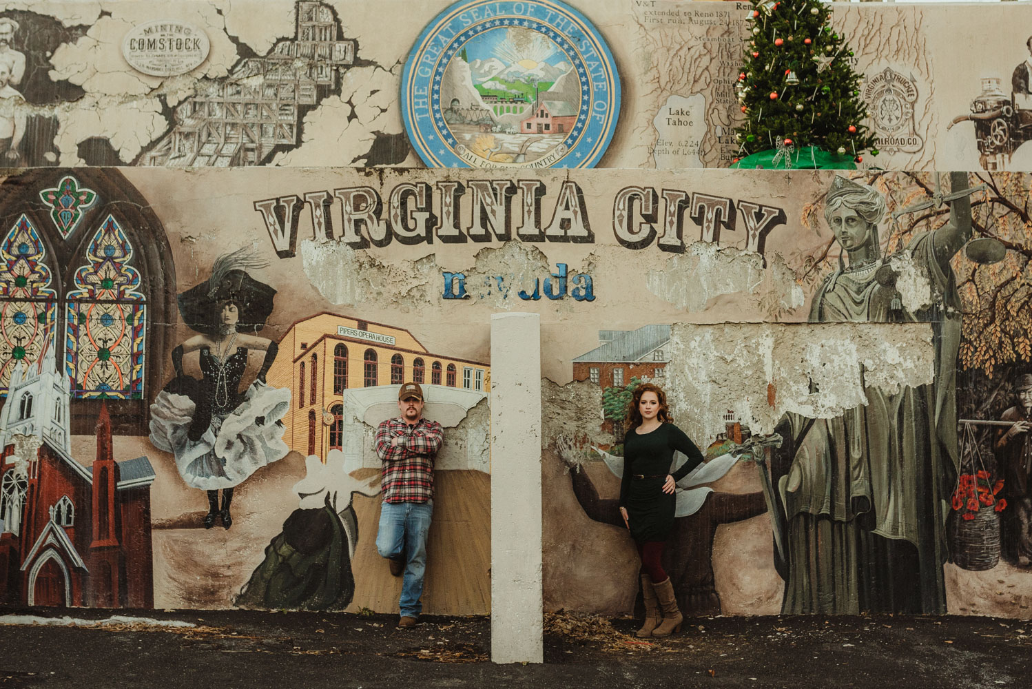 Virginia City Engagement session, couple in front of a mural in Nevada
