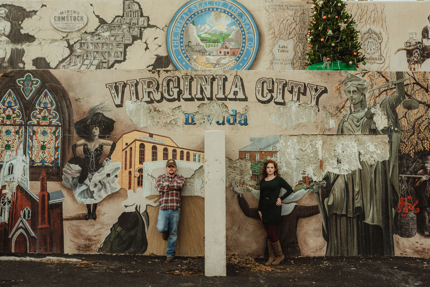 Virginia City Engagement session, couple in front of a mural in Nevada 