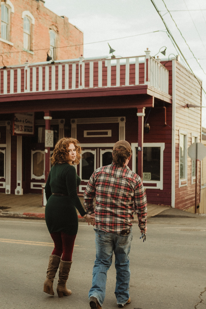 Virginia City Engagement session, couple walking across the street photo