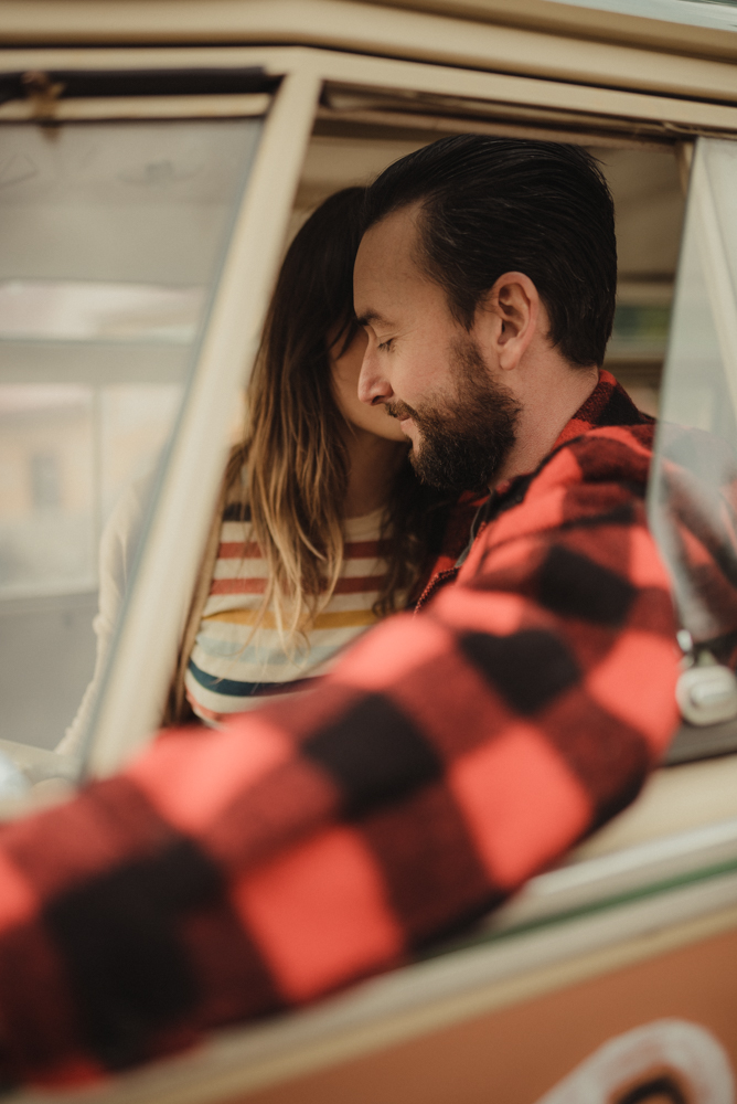 Strawberry California engagement session, couple cuddling in an old VW bus