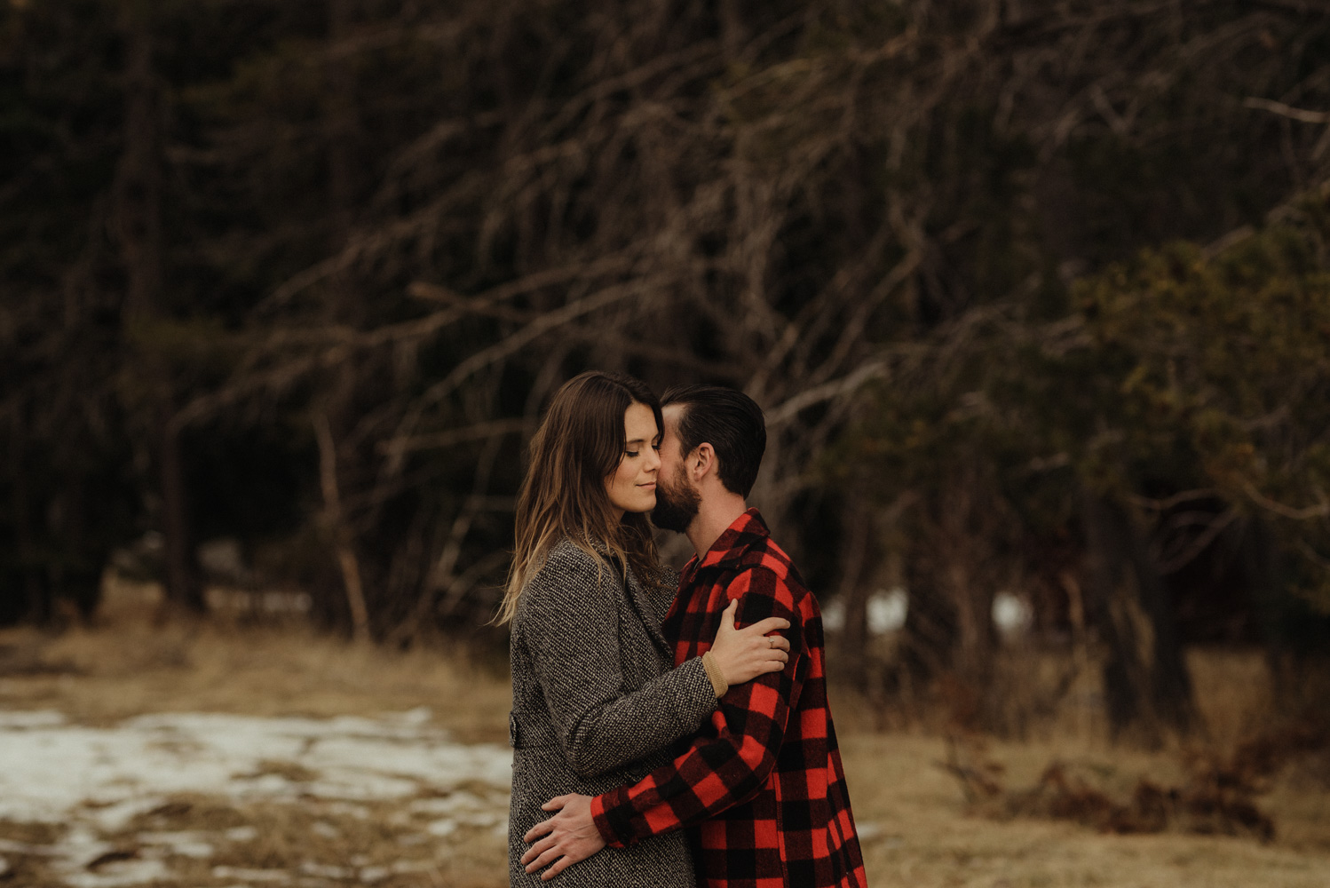 Strawberry California engagement session, couple hugging in the meadows photo