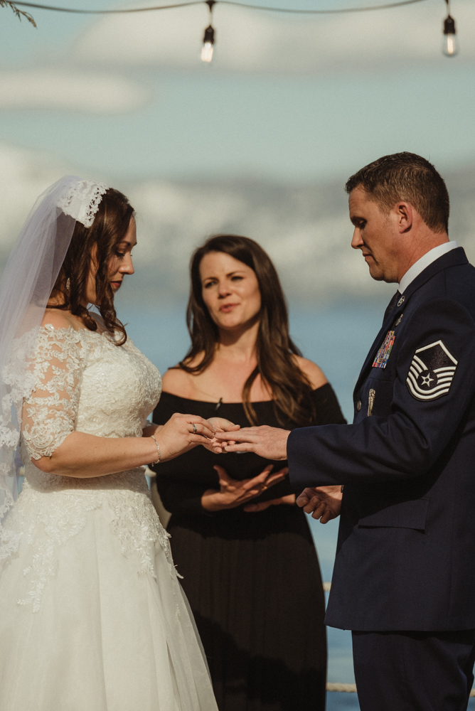 West Shore Cafe Wedding, bride exchanging rings photo