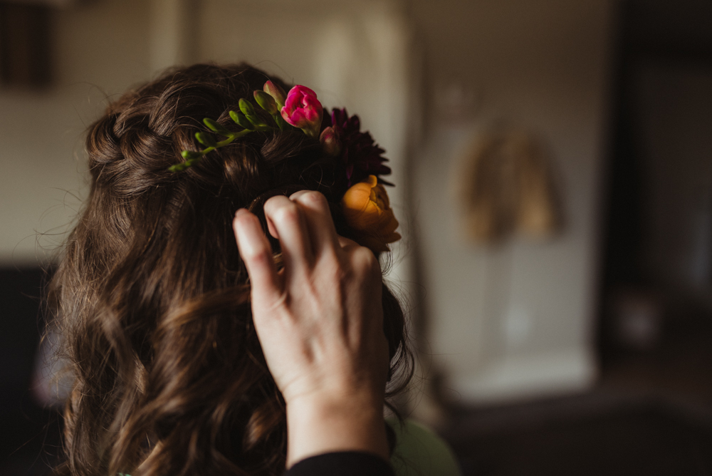 Emerald Bay Elopement, bride with flowers in her hair photo