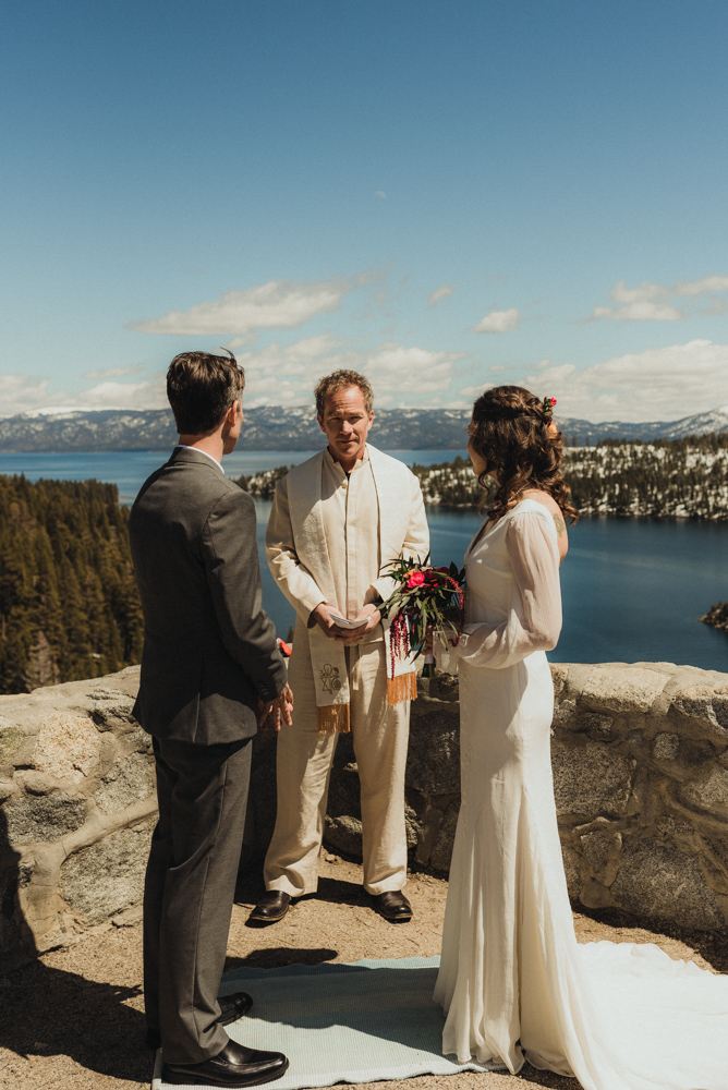 Emerald Bay Elopement, couple during the ceremony photo