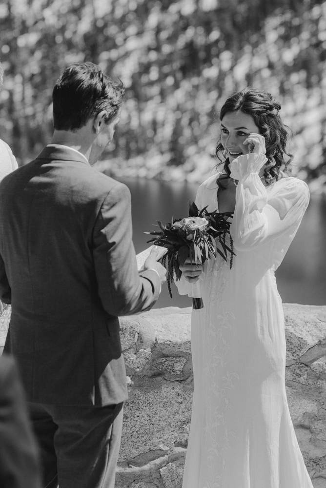 Emerald Bay Elopement, bride crying during her vows photo