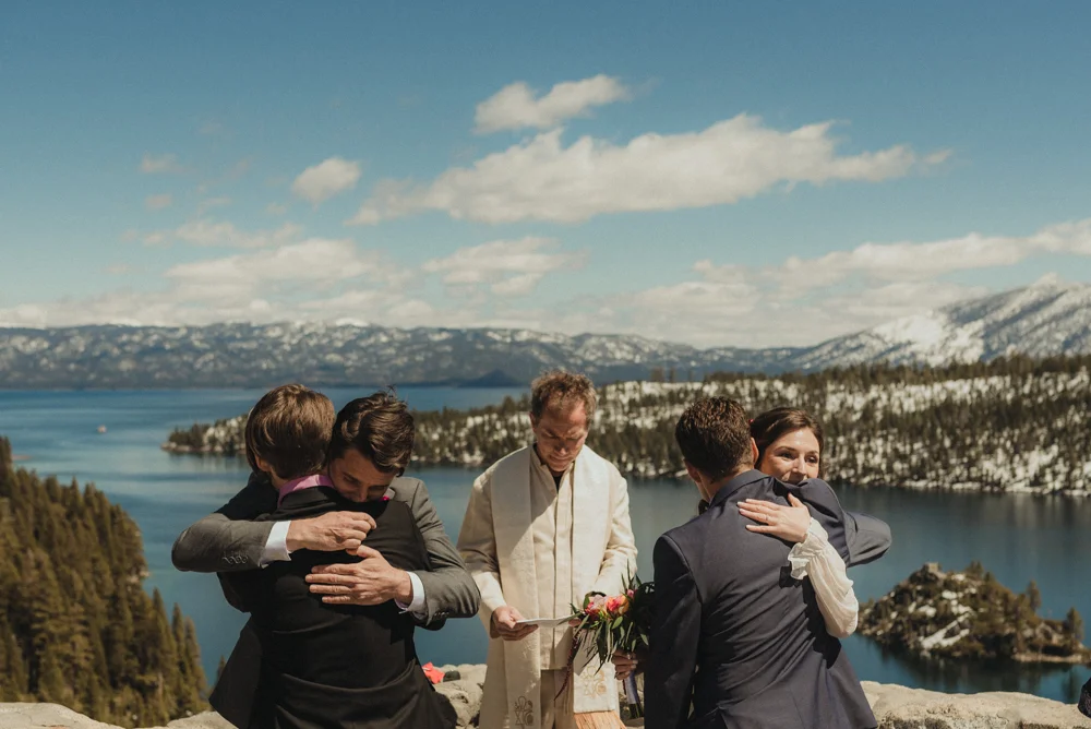 Emerald Bay Elopement, bride and groom hugging sibling photo