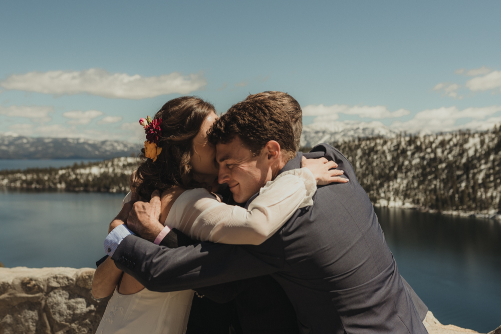 Emerald Bay Elopement, bride and groom hugging sibling photo