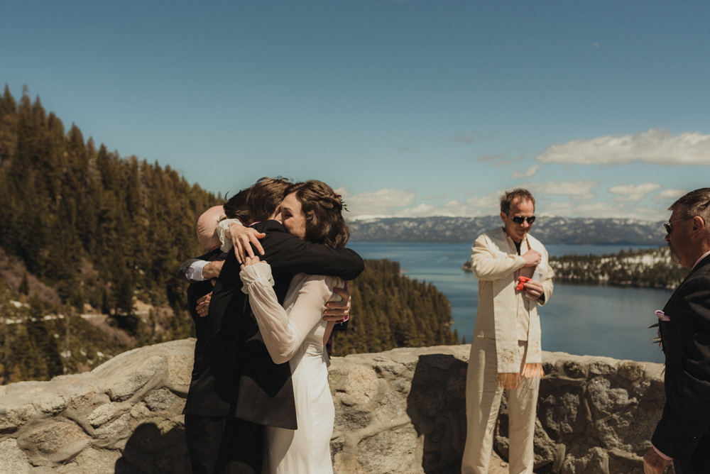 Emerald Bay Elopement, bride hugging family photo