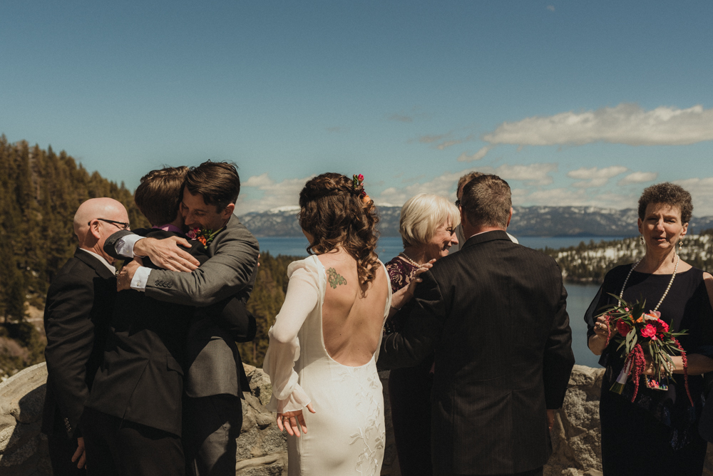 Emerald Bay Elopement, groom hugging family photo