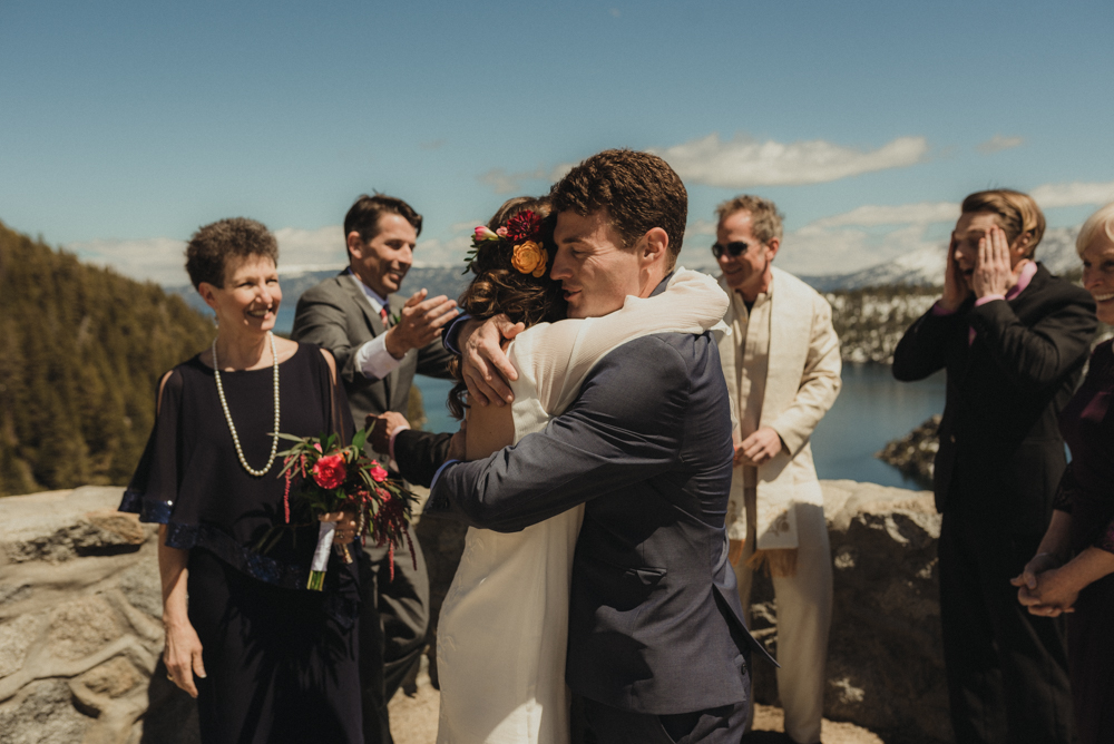 Emerald Bay Elopement, hugs after ceremony photo