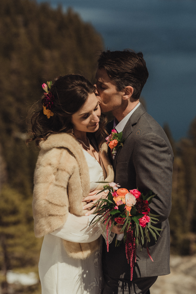 Emerald Bay Elopement in April, couple kissing photo