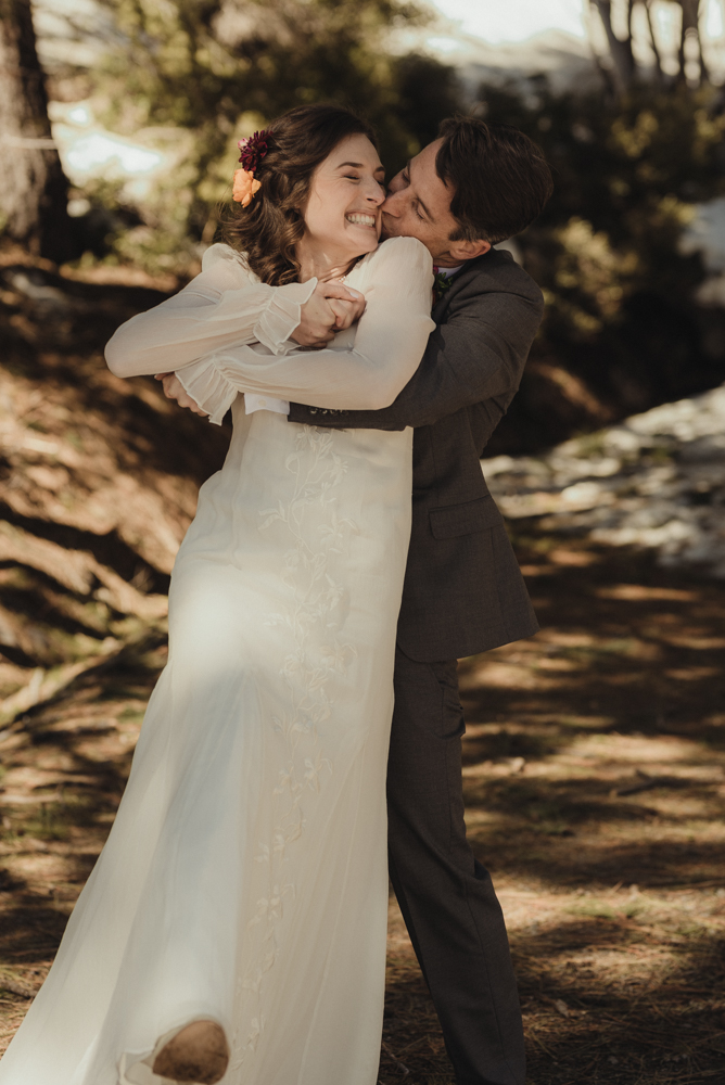Emerald Bay Elopement in April, couple hugging photo 