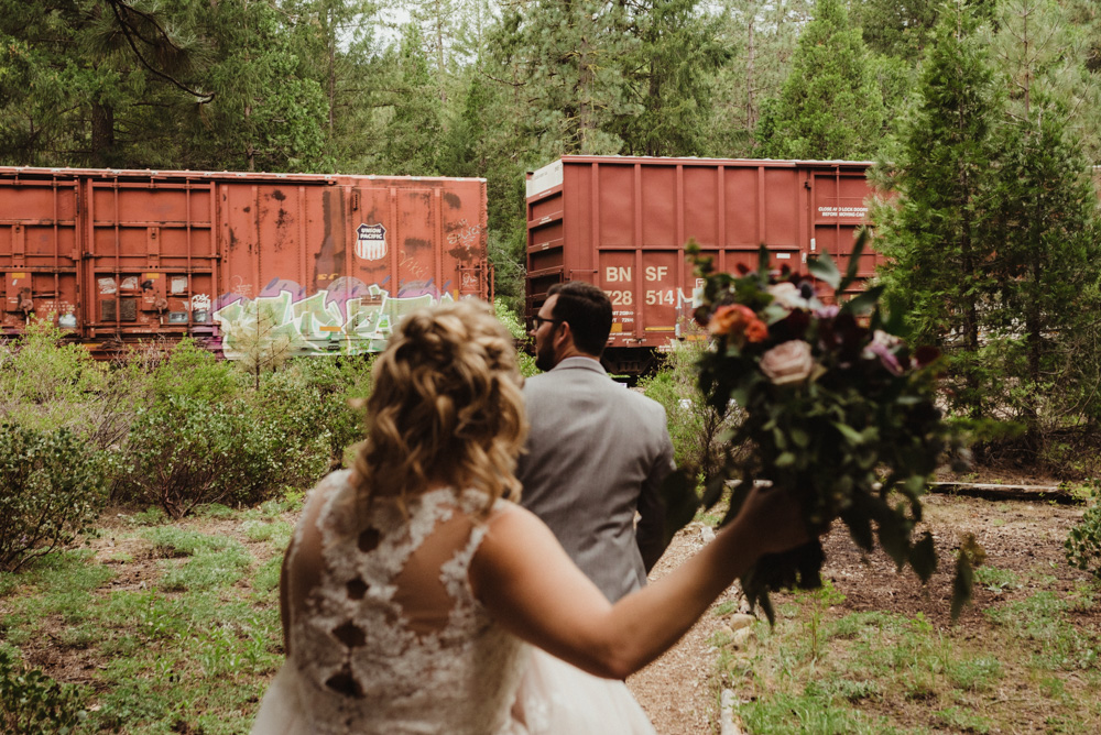 Twenty Mile House Wedding, photo of couple trying to catch the train