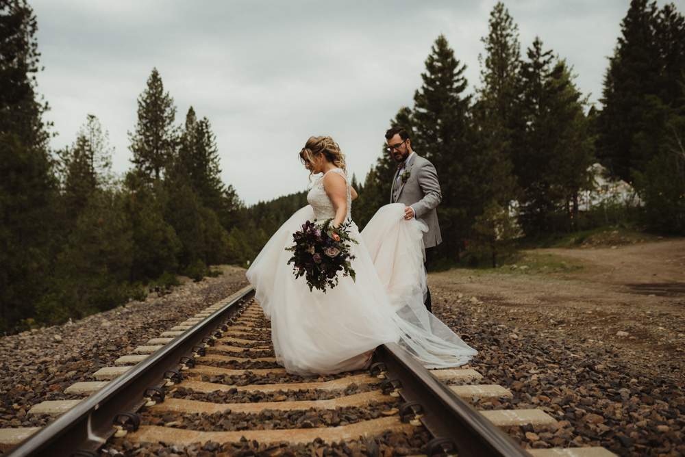 Twenty Mile House Wedding, photo of couple crossing the train tracks