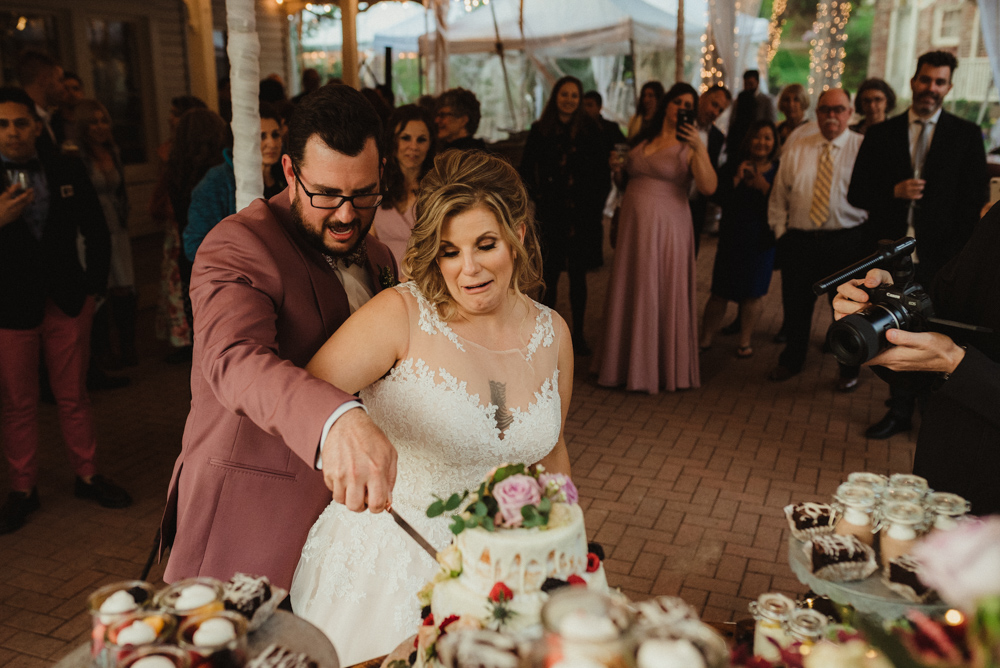 Twenty Mile House Wedding, photo of couple cutting the cake