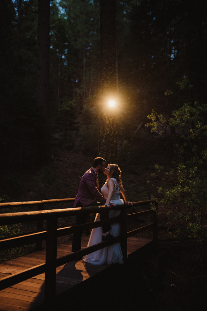 Twenty Mile House Wedding, photo of couple on a bridge at night