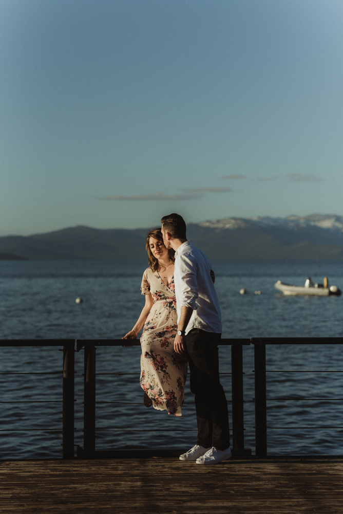 Lake Tahoe Engagement session, couple hanging out on a dock photo