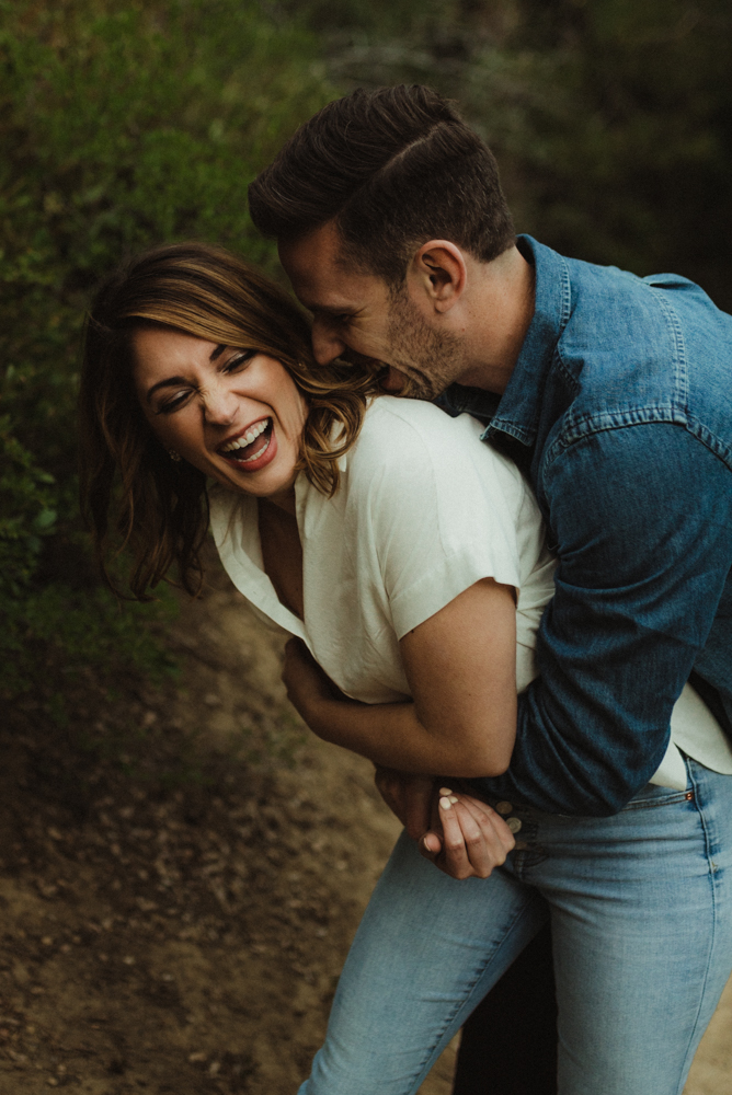 Lake Tahoe Engagement session, couple laughing from a photo prompt