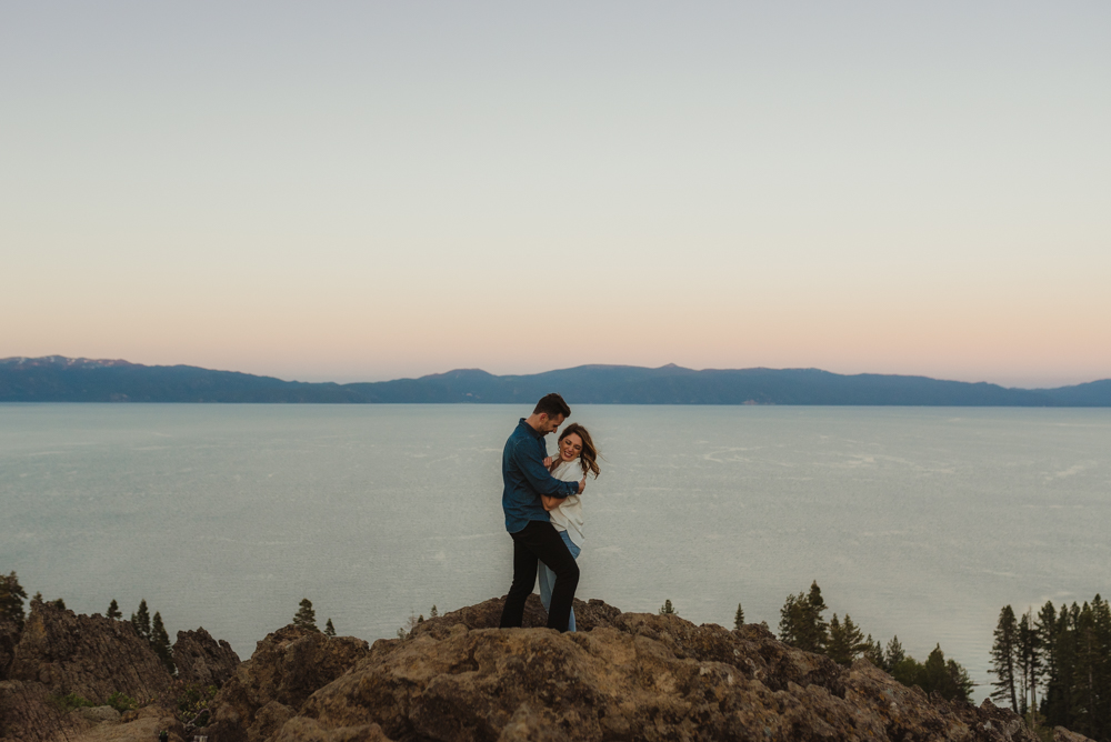 Lake Tahoe Engagement session, couple on a cliff during sunset photo