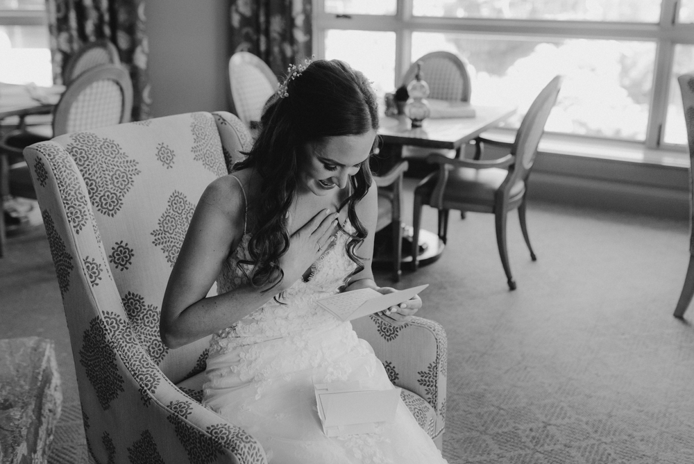 Martis Camp Wedding, bride reading a letter photo